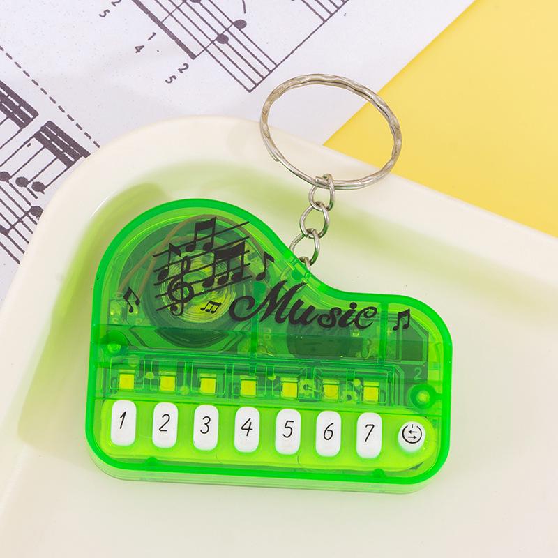 Mini Handheld Luminous Electronic Piano Keychain for Kids