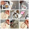 Stylish Floral Pearl Beaded Phone Lanyard for Women – Light Luxury, High-End Feel, Anti-Lost Chain