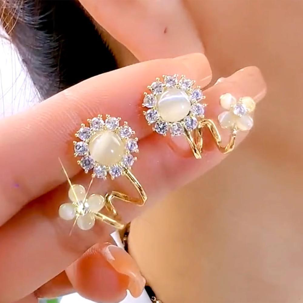 Cercei stud Ochi de Pisică Acul de Argint: Set de îngrijire pentru piercingul urechii din șase piese cu design cartilaj fără somn pentru femei.