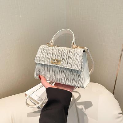 Sommer schilfgeflochtene schöne kleine quadratische Tasche neue einfache und modische tragbare Schulter-Umhängetasche Temperament fortschrittliche Textur
