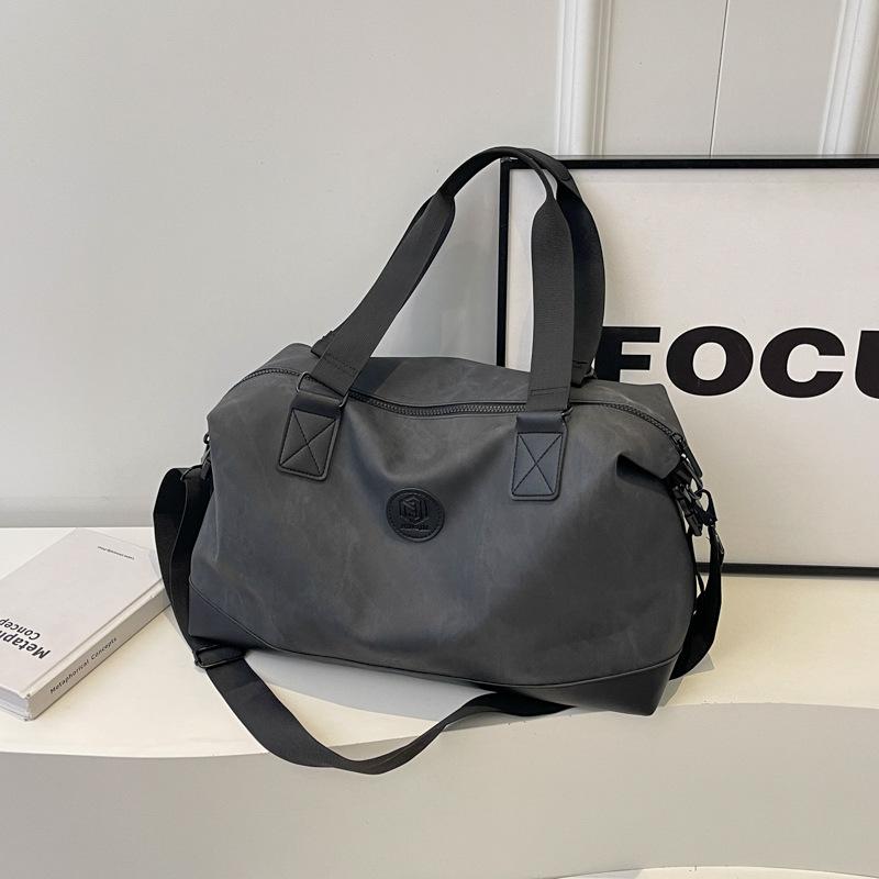 Large-capacity hand-held travel bag Women's fashion and light going out luggage bag Men's business trip travel storage boarding bag