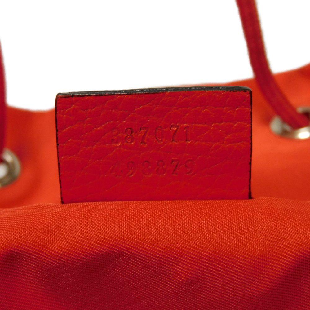 Used 9539 GG Nylon Daypack 387071 7927 Double G Calfskin Drawstring Logo Embossed Orange Red Men's from Japan AUTHENTIC