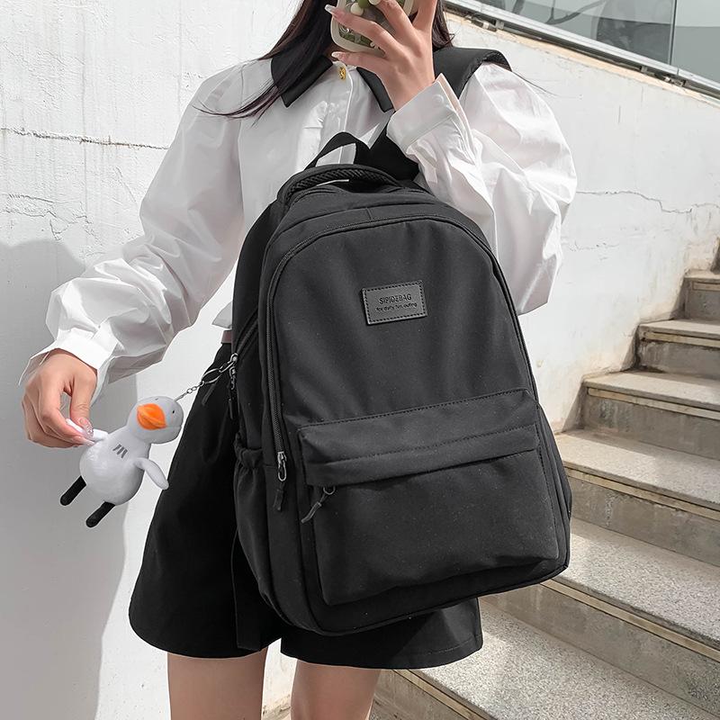 Labelled student schoolbag computer bag spring and summer new large-capacity simple backpack