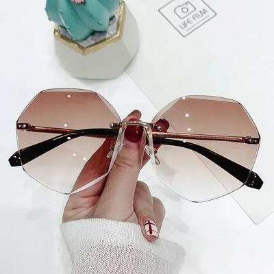 Rimless Sunglasses Women'S Retro Metallic Sun Glasses Uv Protection New Fashion Cutting Lens Eyewear Uv400 Sun Glasses