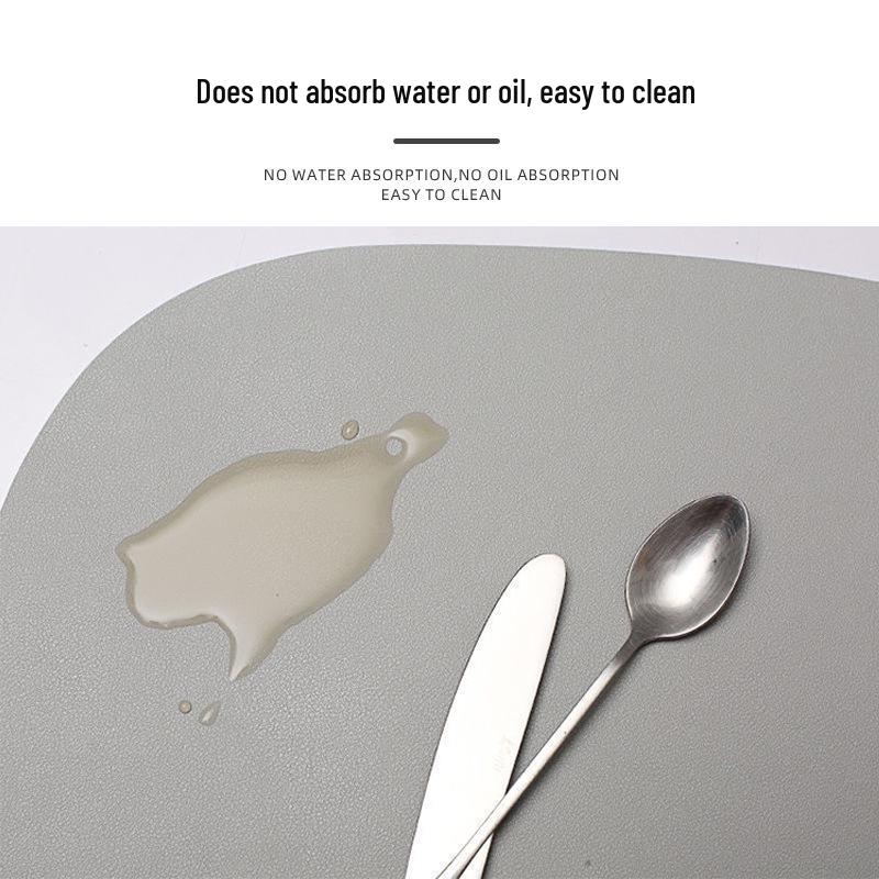 High-End Double-Sided Waterproof PU Leather Placemat - Oil-Proof, Heat-Insulated, Light Luxury Water Drop Design.