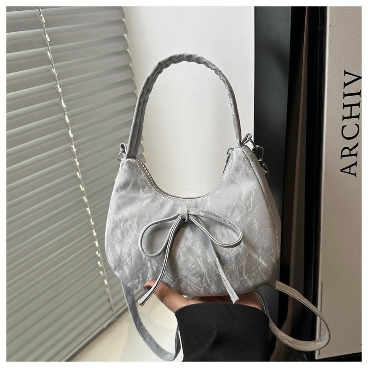 Niche handbag women's 2025 new fashionable versatile shoulder underarm bag, foreign style super fire messenger crescent bag