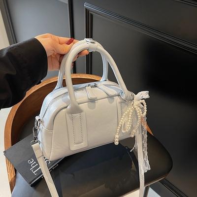 Litschi-Muster tragbare Bowlingtasche Damen neue trendige Mode Nische Kissen-Tasche Umhängetasche