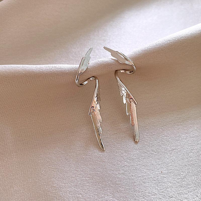 Rotating wing stud earrings cold wind temperament earrings personality high sense earrings