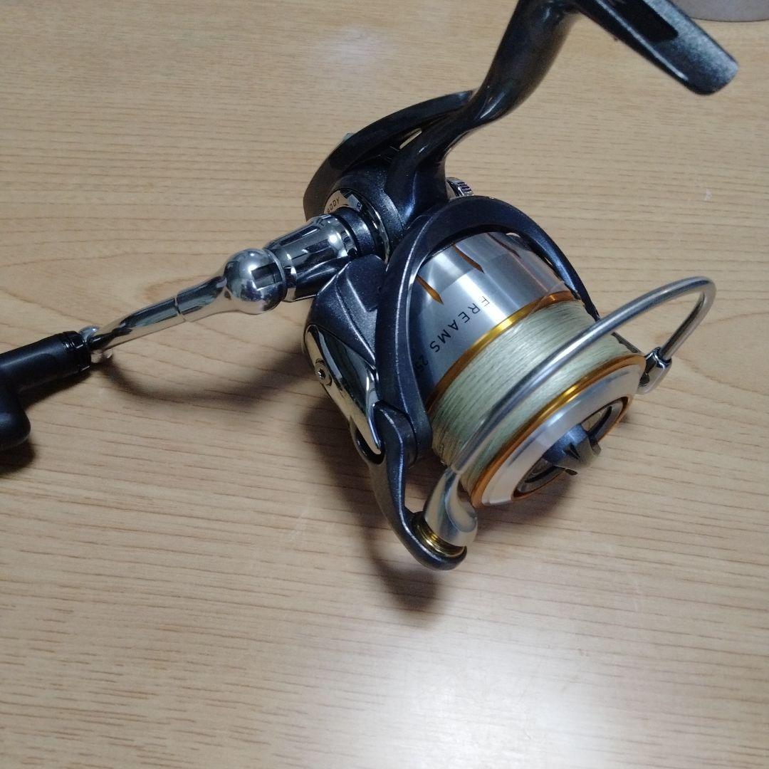 Used DAIWA FREAMS spinning reel body complete with accessories
