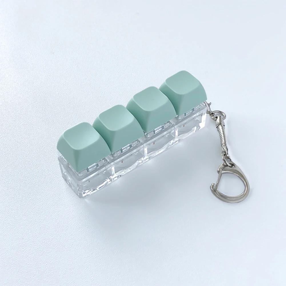 4-Tasten-Tastatur-Tasten-Spielzeug Party Stressabbau DIY Fidget-Tasten-Kappe Fidget-Schlüsselanhänger Tastatur-Schlüsselanhänger Spielzeug Finger-Tastatur