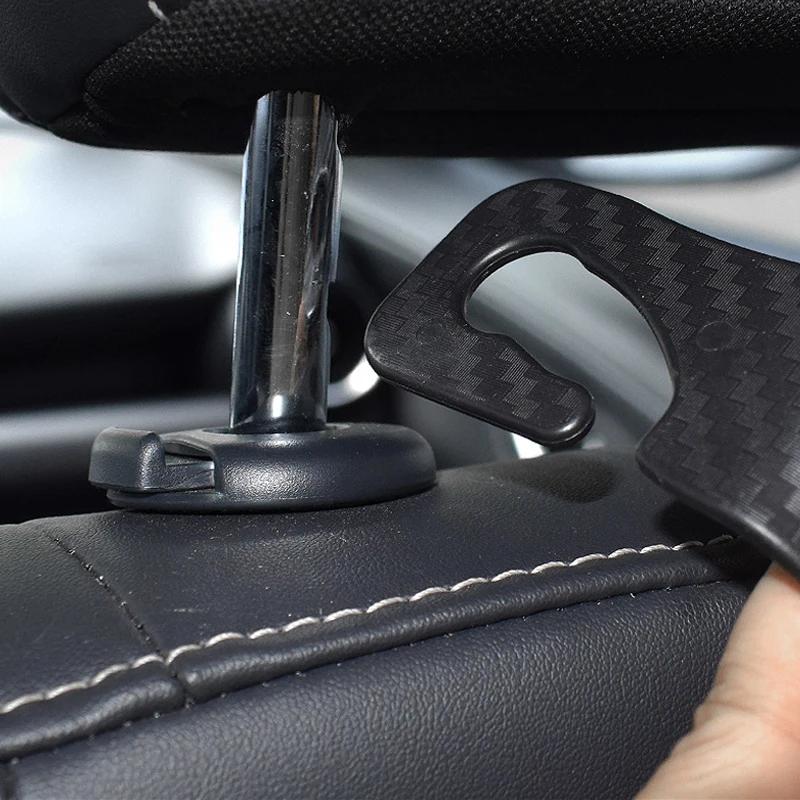 4 Stück Carbonfaser-Haken für die Kopfstütze des Autositzes, Auto-Rücksitz-Organizer, Kleiderbügel, Handtaschen- und Kleiderhalterung, Auto-Innenausstattung