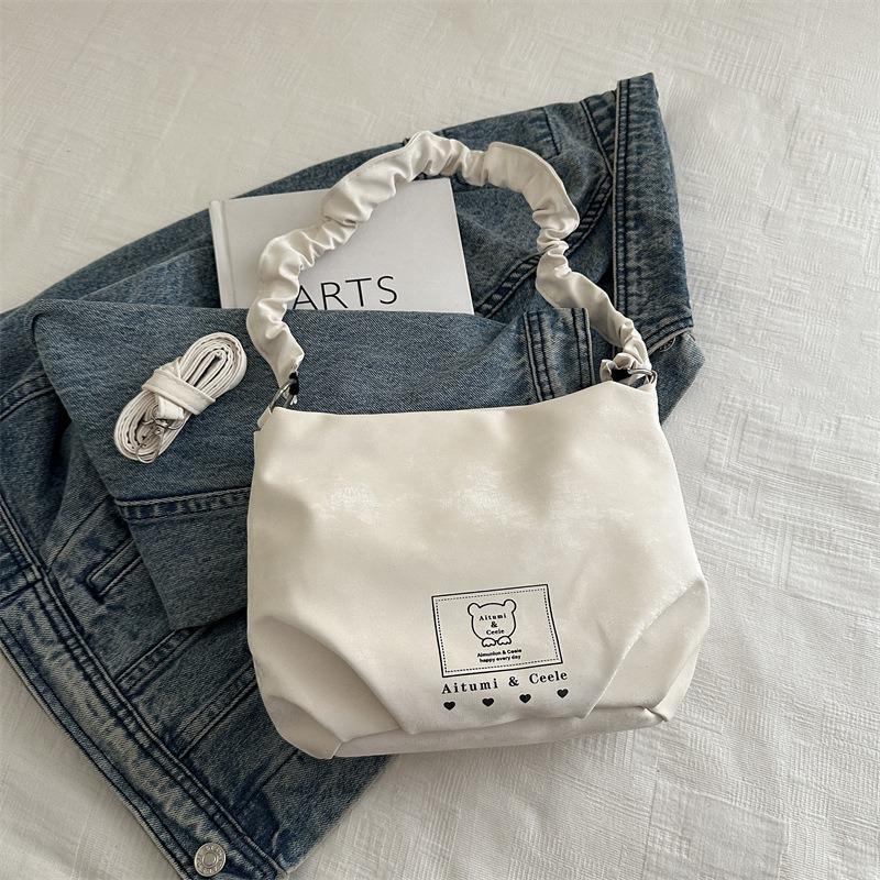 

New cute cartoon printed versatile shoulder bag student book girl large-capacity commuting handbag