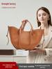 Women's Versatile Genuine Leather Tote - High-End Cowhide Shoulder Handbag with Large Capacity.