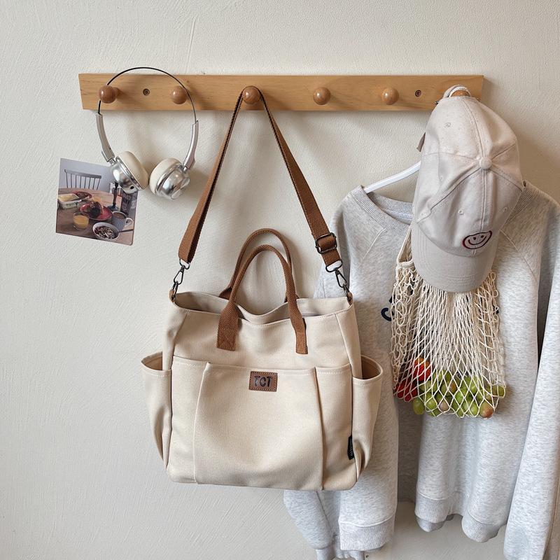 2026 Women's Large Capacity Canvas Tote: Versatile, Fashionable Handheld Shoulder Bag for Commuting