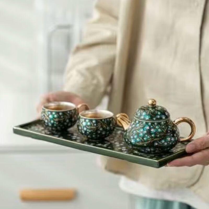 

Qiu Qiao Jade Green Honeysuckle Portable Kung Fu Tea Set