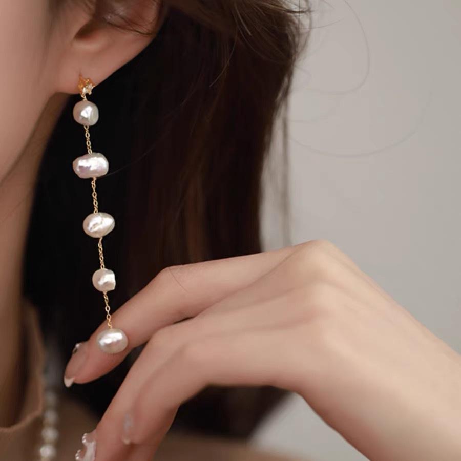 

Natural freshwater baroque pearl silver needle long women s earrings 2024 new high-end stud earrings trendy Silver needle
