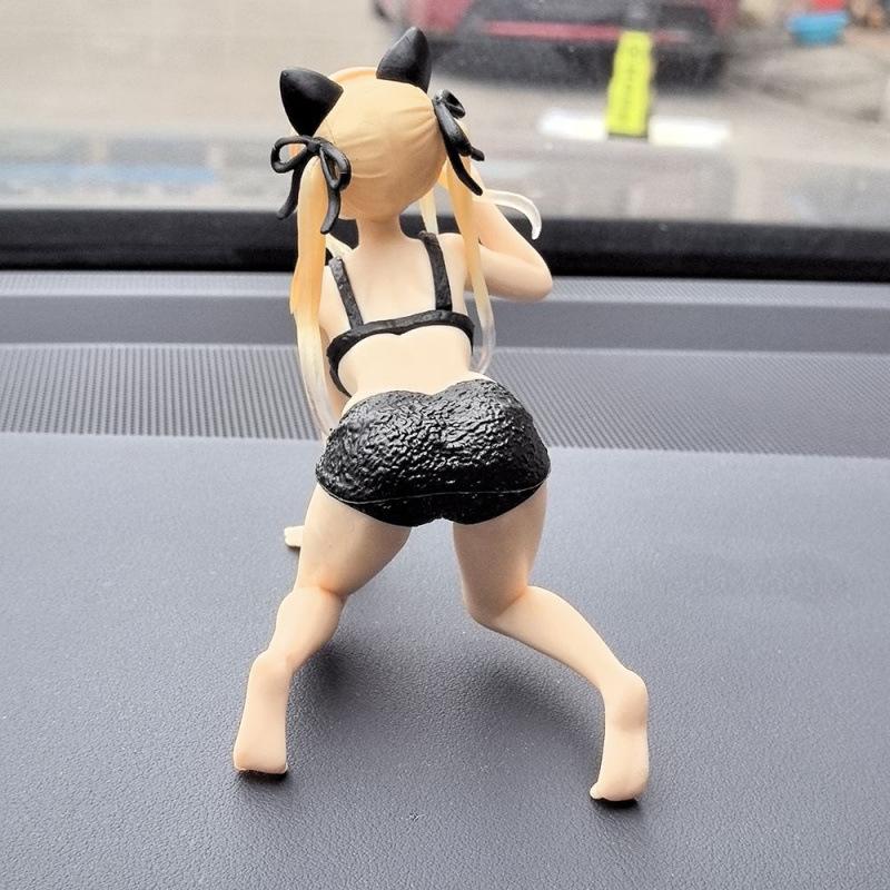 A few boxes of car car ornaments featuring cute and beautiful female 2D girl figurines and models are here to hit the market