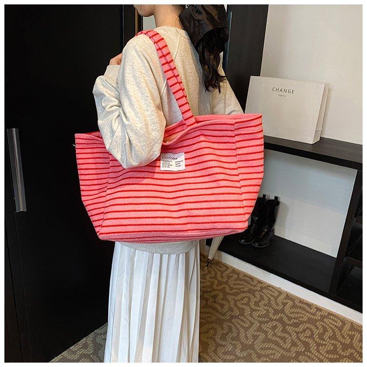 Nischen-Streifen-Tragetasche, lässiger Stil, guter Pendelpartner