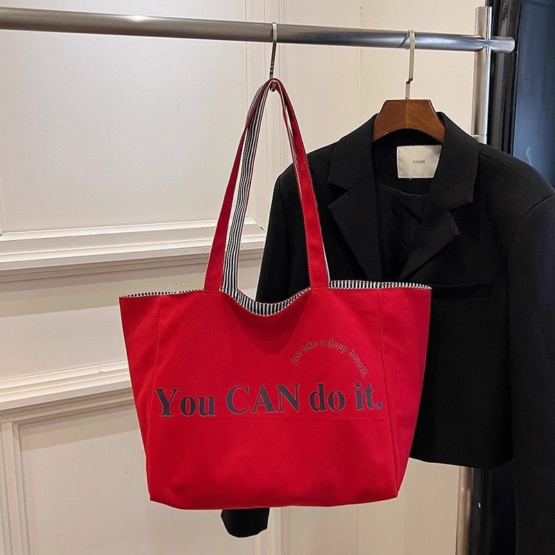 New Red Letter Casual Striped Large Capaci Tote Bag Women's 2026 New Fai Commuter Oulder Bag for Class Handheld Canvas Bag
