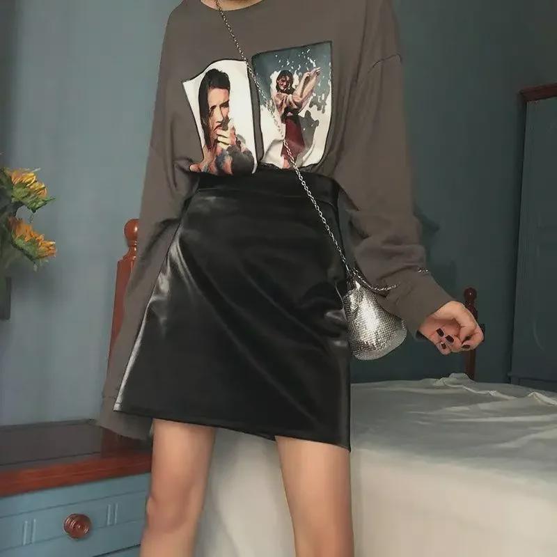 Černá kožená sukně áčkového střihu s vysokým pasem: Ideální na jaro a podzim