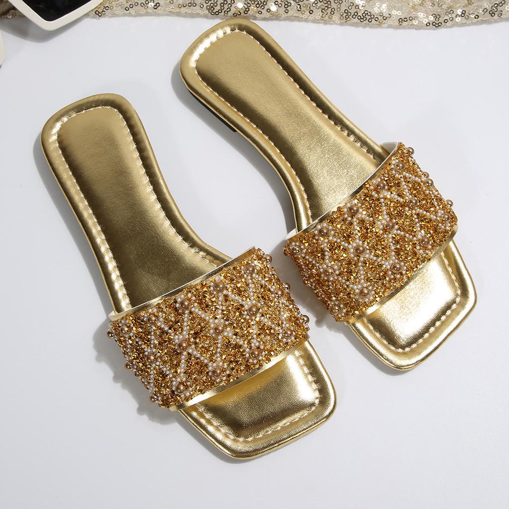 [Foreign Trade] Beautiful flat-bottomed cool slippers for women to wear high-end skirt French going out beach sandals