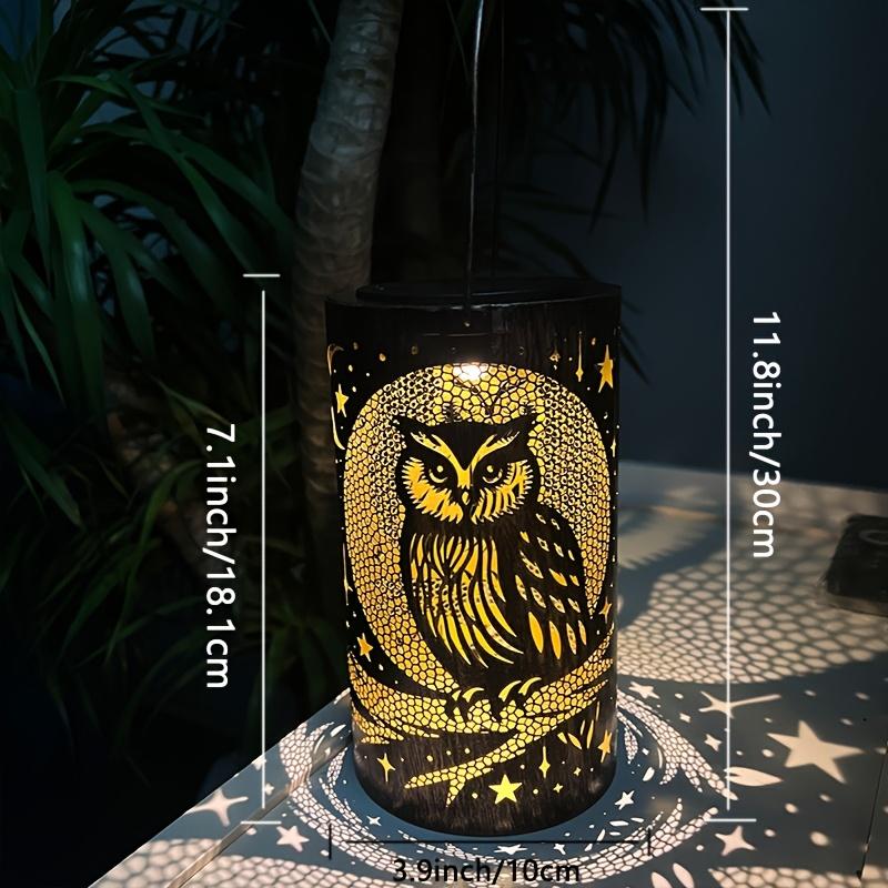 Solar Lantern Featuring a Hummingbird Design, Perfect for Outdoor Decor. It Includes a 600Mah Rechargeable Battery, Making It Ideal for Yard Art