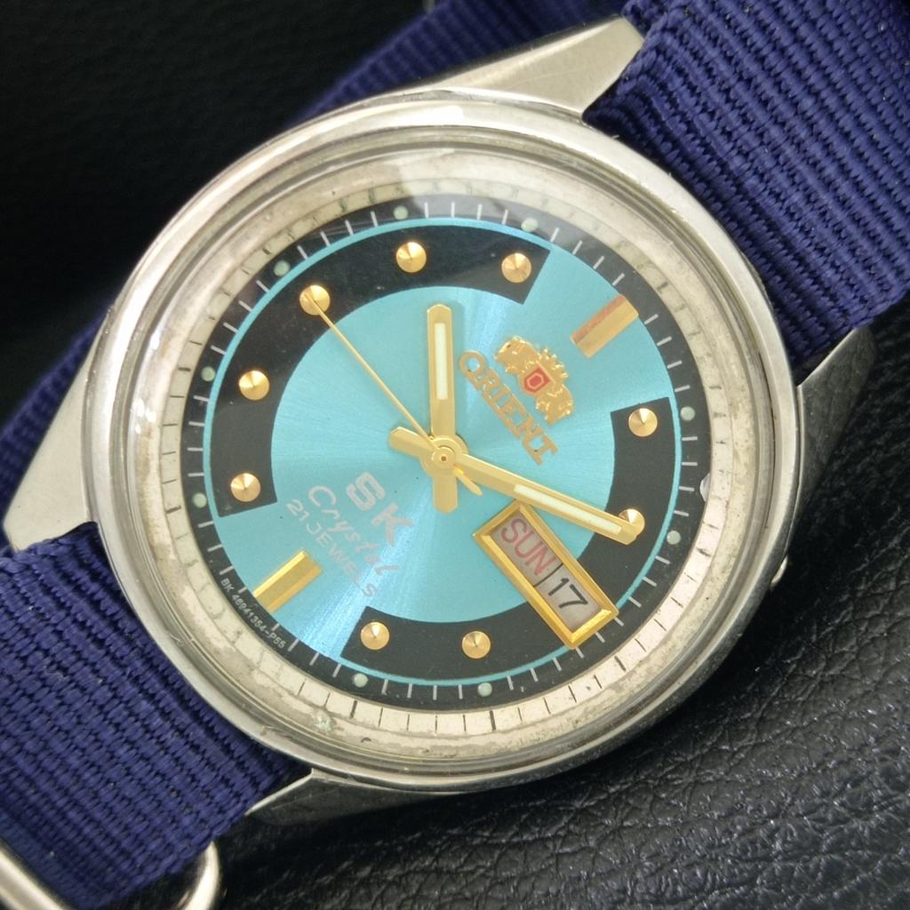 

VINTAGE ORIENT SK AUTOMATIC JAPAN 46943 MENS SKY BLUE COLOR DIAL WATCH a703319-1