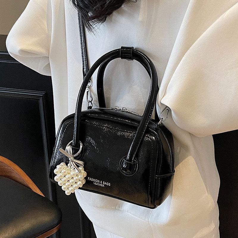 Summer new fashion simple style Korean version sweet portable pillow bag high sense versatile commuter messenger women's bag