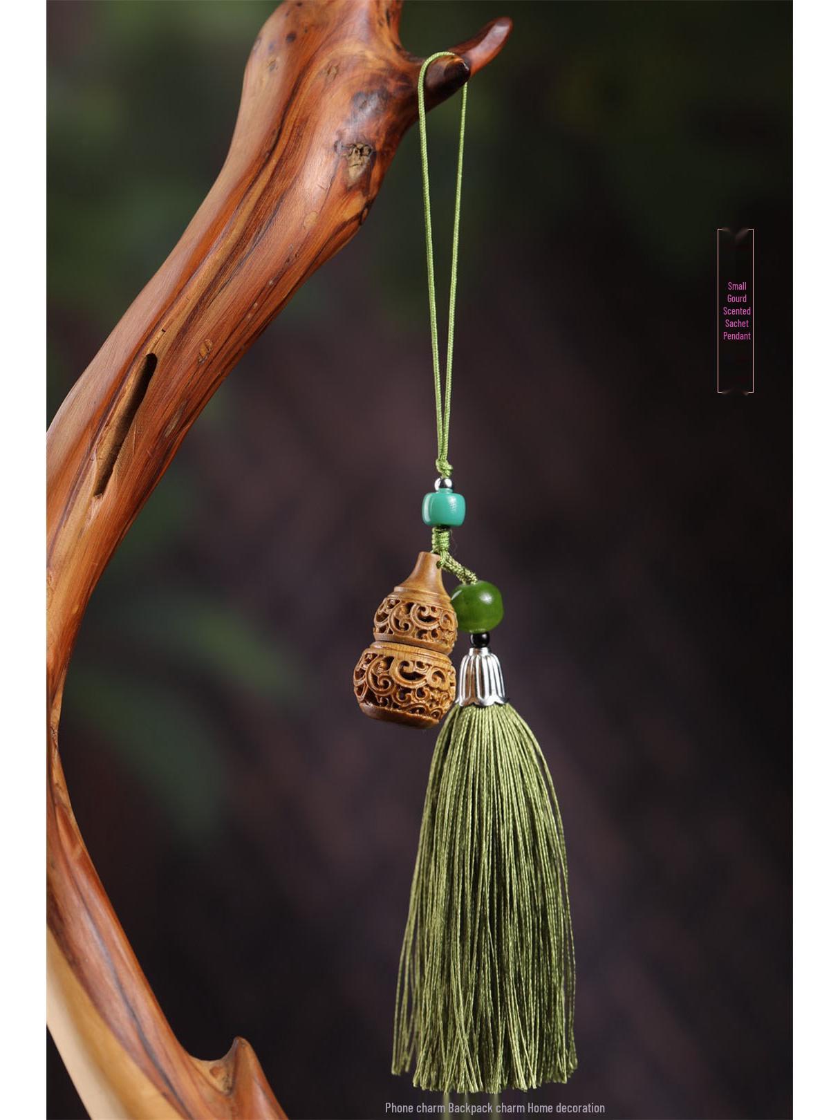 

Green Sandalwood Hollowed-Out Incense Ball Ornament: Retro Car Hanging, Phone Pendant, or Backpack Accessory