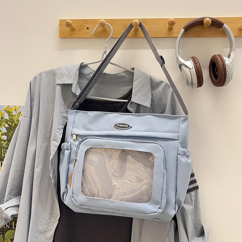 

Japanese ins women s transparent JK pain bag daily large-capacity versatile college students and girls make-up class shoulder bag tote bag синій