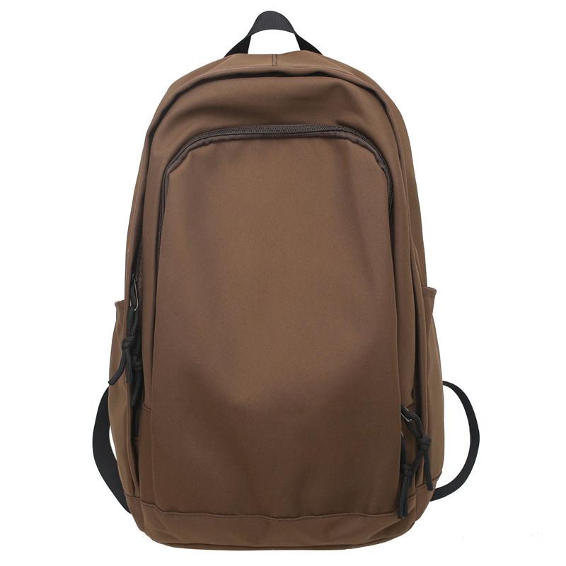 Spring new college style solid color student schoolbag Korean version large-capacity junior high school backpack