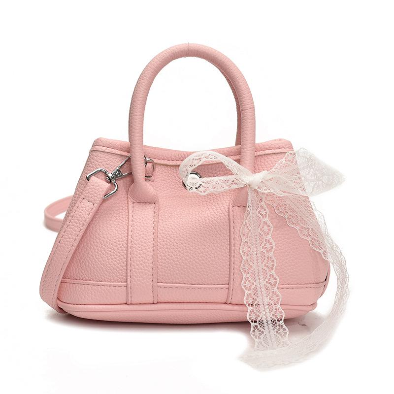 Korean fashion simple casual style portable bucket bag femininity high sense commuting versatile solid color messenger bag