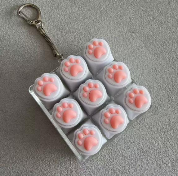 

Compact Pink 9-Key Cat Pinching Silent Keyboard Fidgets Portable Stress Relief Tool Innovative Toy for Travel Office зніміть рожевого кольору