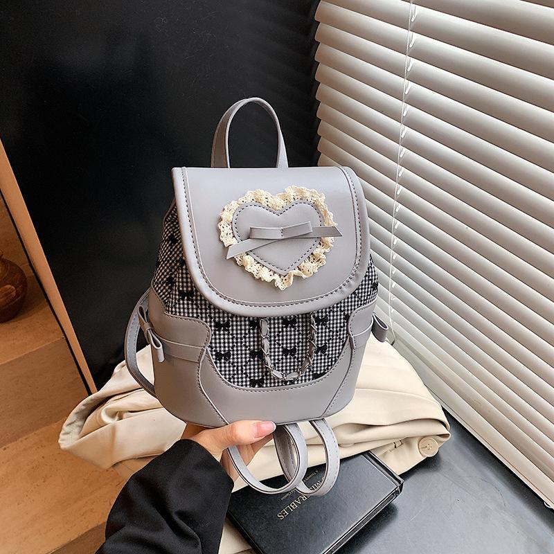 College student fashion versatile bow backpack bag women's summer new simple commuter bucket bag