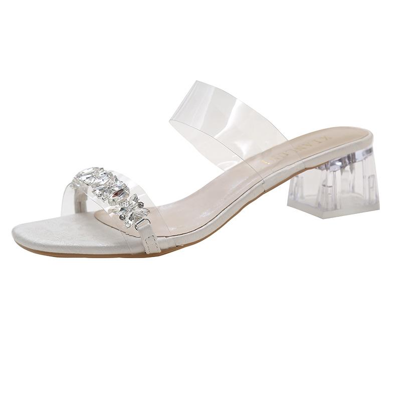 

Летом 2025 года носят новые французские стразы снаружи, крутые тапочки, женственность, прозрачный кристальный толстый каблук и шлепанцы. 35