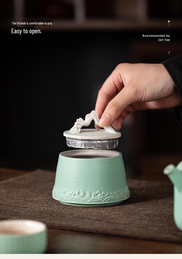 Chinese-Style Ceramic Tea Caddy: Small Mountain Viewing Sealed Jar with Moisture-Proof Packaging for Red and Green Pu'er Tea