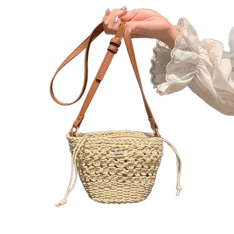 Cute bucket crossbody straw woven bag new small fresh hollow shoulder woven bag vacation beach bag versatile women's bag