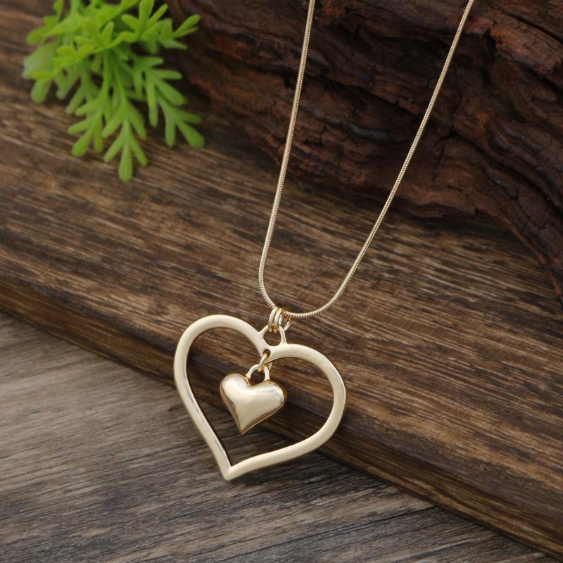New Glossy Hollow Love Snake Bone Chain Long Pendant Women's Simple and Advanced Autumn and Winter Heart-shaped Long Necklace