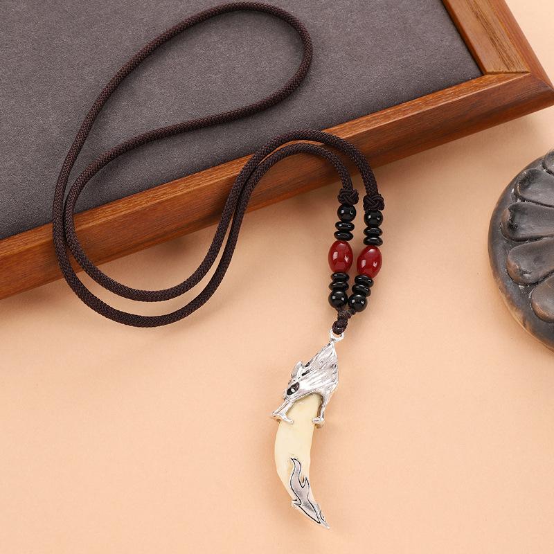 Retro woven dog tooth necklace men's and women's long niche personalized wolf tooth pendant pendant sweater chain accessories