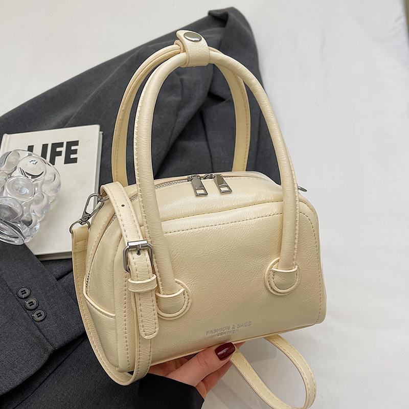 Summer new fashion simple style Korean version sweet portable pillow bag high sense versatile commuter messenger women's bag