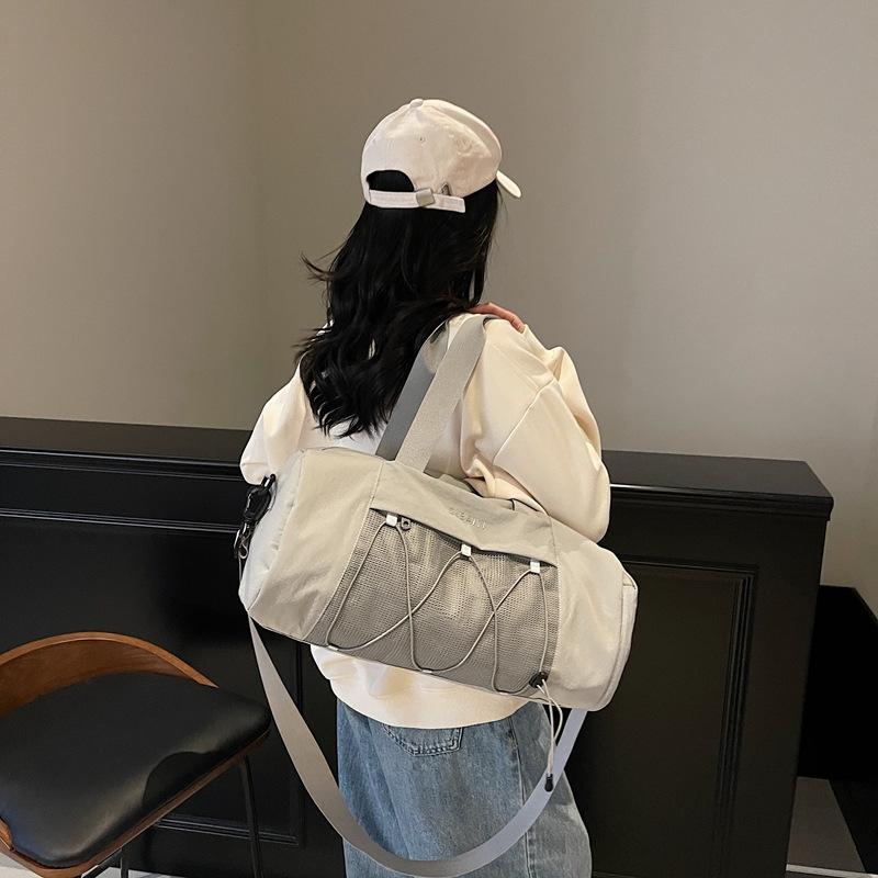 Lätt sportyoga fitnessväska enkel mångsidig stor kapacitet förvaring kort resväska student handhållen axelväska