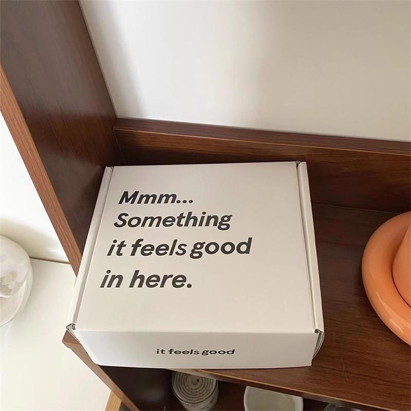 High-Grade UV Printed White Cardboard Display Box for Clothing and Accessories.