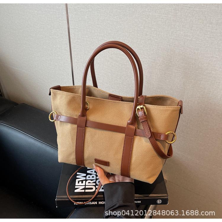 

2025 new design niche handbag simple large capacity bucket bag casual canvas commuter messenger bag tide хаки