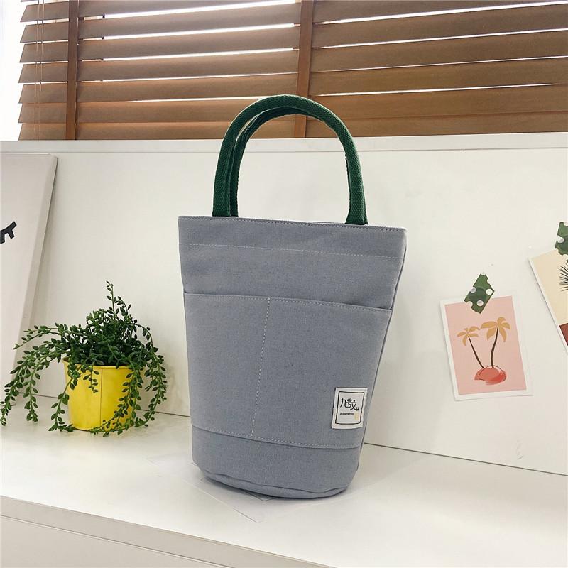 

Solid color cute college style canvas versatile soft sister Harajuku student female messenger bag small bag bucket bag