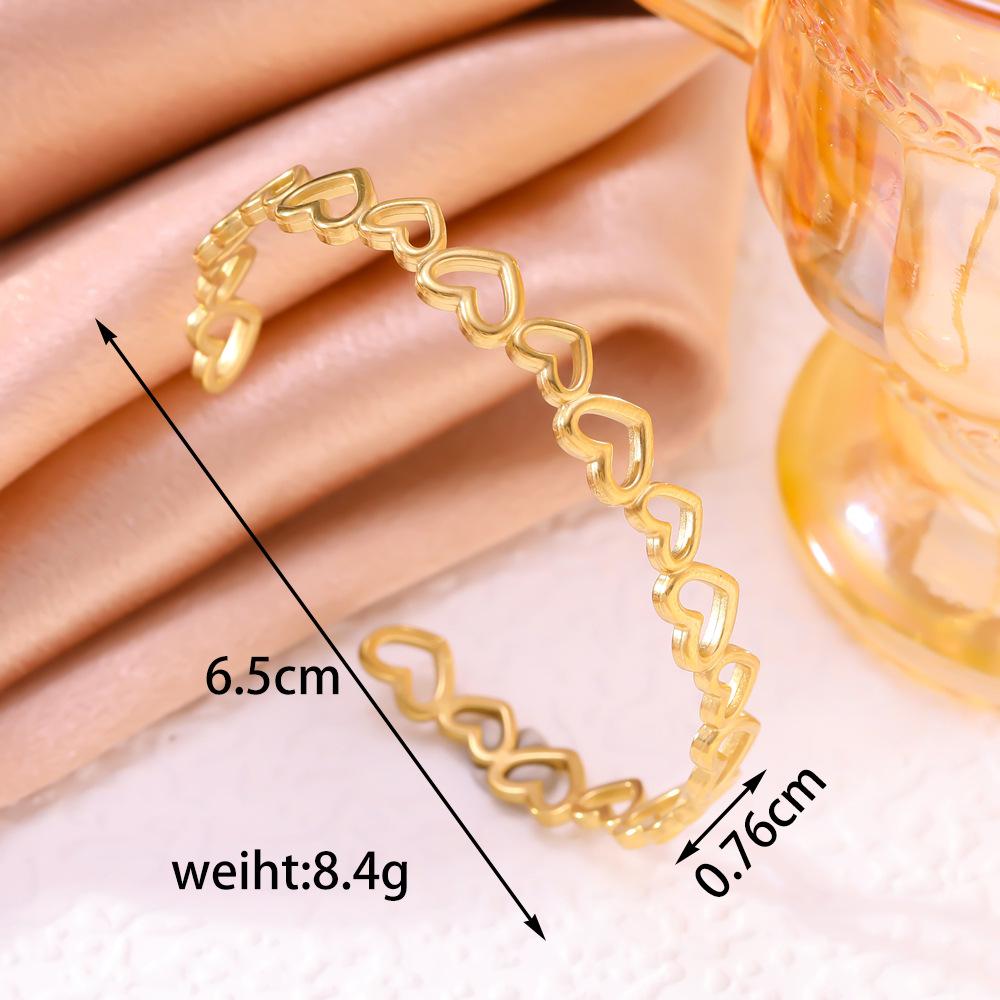 Heart-to-Heart Titanium Steel Hollow Heart Bracelet - Adjustable, Simple, Trendy Women's Bangle