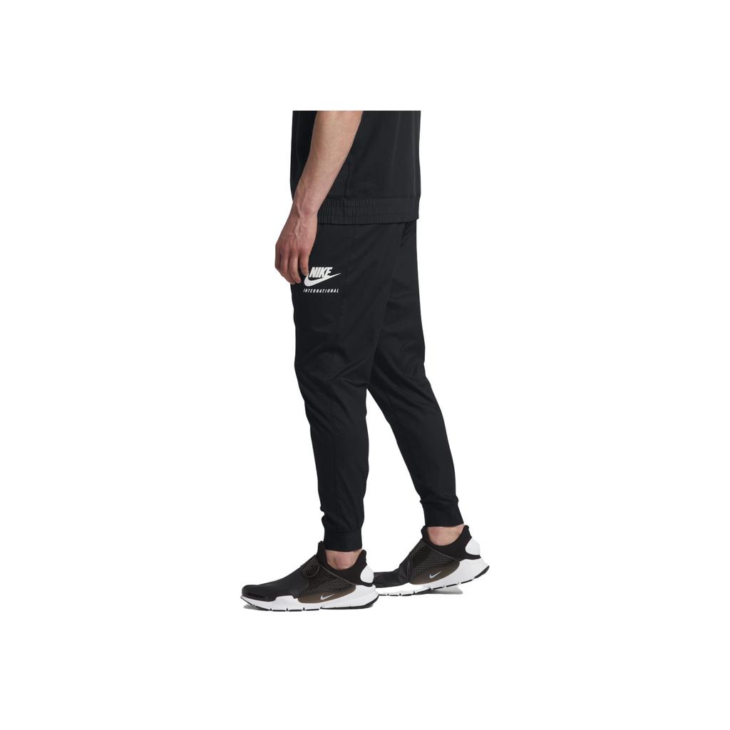 Nike International Woven Jogger Solid Color Casual Tapered Knit Pants Men Bottoms Black 880540-010