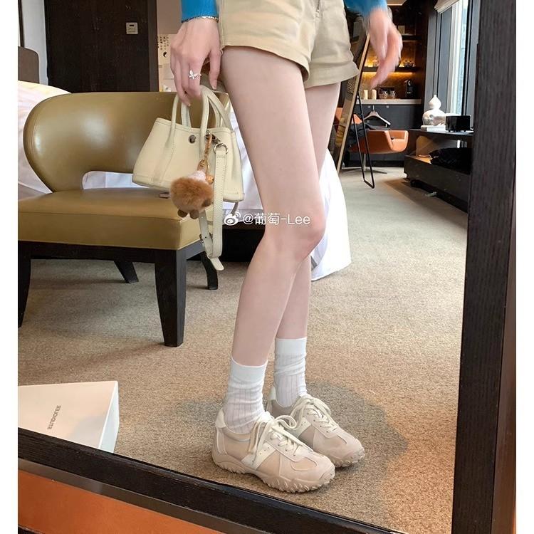 Grape mother's same 7cm inner height increase~ invisible leg pull splicing round head pair of shoelaces casual sports shoes German training shoes wom