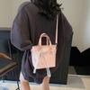 Premium sense simple portable bucket bag women's 2025 summer new fashion contrasting color messenger bag