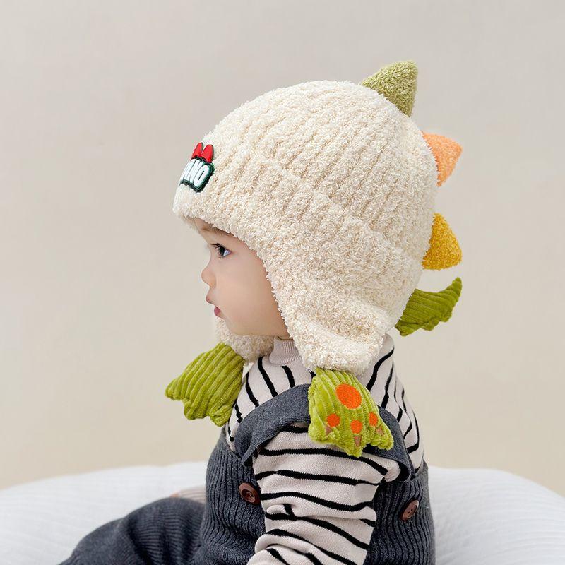 New little dinosaur cartoon ear protection hat boy baby knitted hat autumn and winter new children's wool warm and windproof