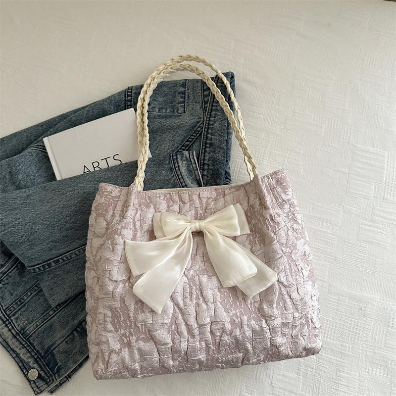

Bow fashion large capacity shoulder 2025 summer new this year popular leisure bag niche design tote bag рожевий